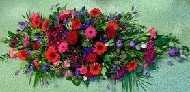 RED AND PURPLE CASKET SPRAY
