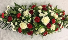 FLORIST SELECTION RED AND WHITE CASKET SPRAY