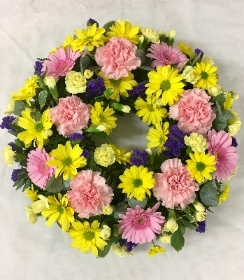PINK, YELLOW AND PURPLE WREATH